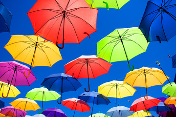 Fototapeta na wymiar Multicolor umbrellas. Street art. Puerto Banus city, Marbella, Andalusia, Spain.