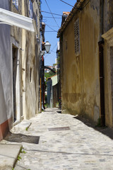 Deserted street in center of Historic Baska on Krk Island on April 30, 2017. Croatia