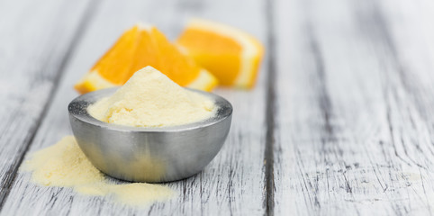 Portion of Orange fruit Powder (selective focus)