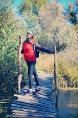 girl on a wooden bridge