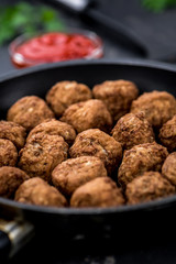 Meatballs (fresh made) as detailed close-up shot, selective focus)