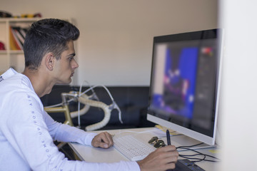 young working with the computer at home or in the office