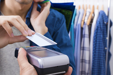 paying by credit card at the store