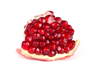 Pomegranate isolated on white background. Macro.