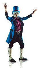 Smiling circus actor in blue tuxedo is presenting something.