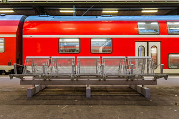 Train Station Metal Wire Bench Public Sitting Waiting German European Outdoors Red Color Closeup