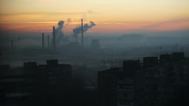 Sunrise in the industrial city. Factory