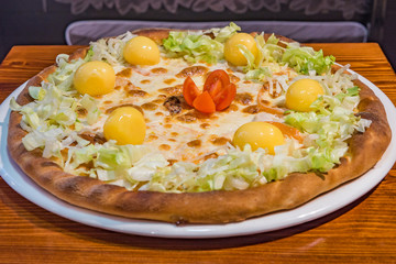 Very tasty pizza in a cafe restaurant