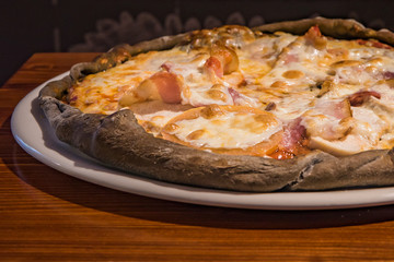 Very tasty pizza in a cafe restaurant