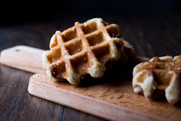 Plain Belgium Waffle on wooden surface.