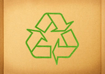 Recycle symbol on cardboard