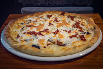 Very tasty pizza in a cafe restaurant