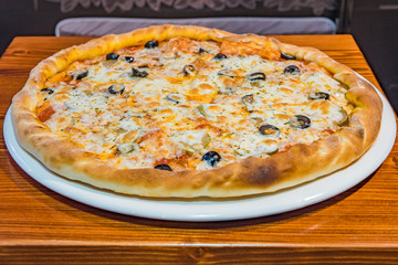 Very tasty pizza in a cafe restaurant