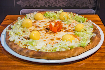 Very tasty pizza in a cafe restaurant