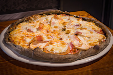 Very tasty pizza in a cafe restaurant