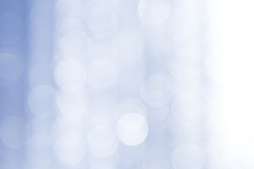 Abstract bokeh over blue blurred background