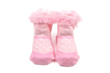 Pink baby socks isolated on white background