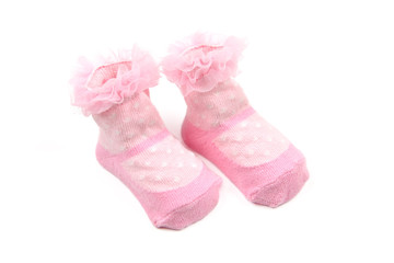 Pink baby socks isolated on white background