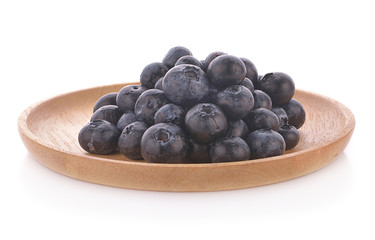 Fresh juicy blueberries isolated on white background.