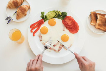 Close-up photo of of an omelette. Top view of the breakfast.