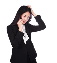 woman in business suit working in stress desperate talking on a mobile phone