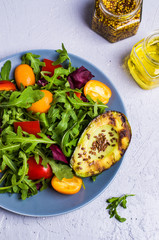 Raw arugula with vegetables