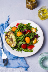 Raw arugula with vegetables