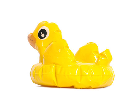 Closeup yellow duck inflatable doll isolated on white background with clipping path