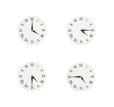 Closeup group of white clock with shadow for decorate show the time in 4 , 4:15 , 4:30 , 4:45 p.m. isolated on white background , beautiful 4 wall clock picture in different time