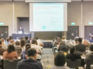 Motion blur of view of seminar with audience in a seminar room