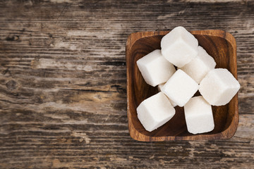 Bowl with cubes of white sugar