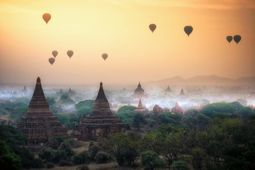 Hot air balloon over plain of Bagan in misty morning, Mandalay, Myanmar