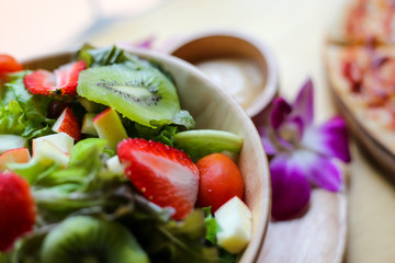 Bowl of healthy fresh fruit salad