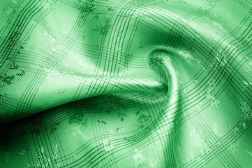 Texture background pattern. Silk fabric is green, Beautiful Green Silk. Drapery Textile Background,