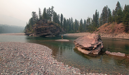 Fly fishing at the confluence of the Flathead and Spotted Bear Rivers in the Bob Marshall...