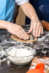 Cooking and decorating christmas gingerbread. Homemade gingerbread.