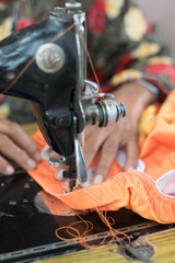 .Women are sewing