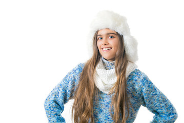 young woman wearing in warm knitted sweater blue and white fur hat. Girl on a white background. Place for text. Young girl in hat and white scarf. girl in winter clothes on  white background
