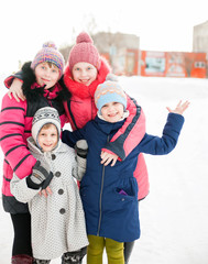 Four girls    in winter  park