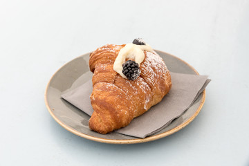 Creamy croissant with berries