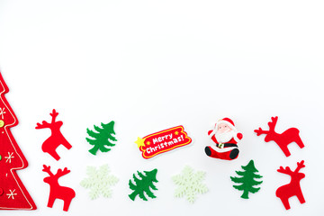 Christmas composition. Christmas tree, dear, Santa Claus on white background. Flat lay, top view