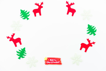 Christmas composition. Christmas tree, dear, Santa Claus on white background. Flat lay, top view