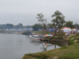 Fototapeta na wymiar Boat on the river Desna. Svenska Fair. Bryansk oblast. (The Vast Russia! Sergey, Bryansk.)