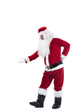 Portrait of Santa Claus dancing curiously isolated on white background.
