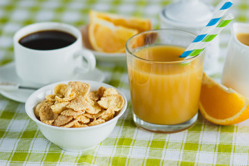 Cup of coffee, muesli and orange juice