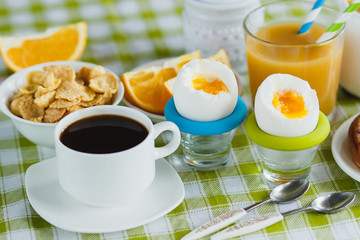 Soft boiled chicken egg, coffee,тmuesli and orange juice