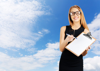 Businesswoman holding a clipboard