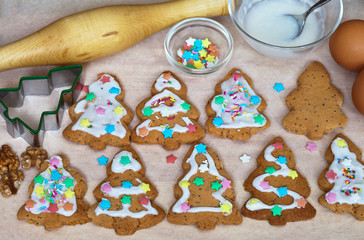 Decoration of homemade cookies with sugar fondant and sweet asterisks. Preparing for Christmas