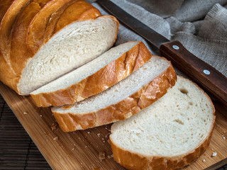 White bread sliced into pieces on a kitchen board