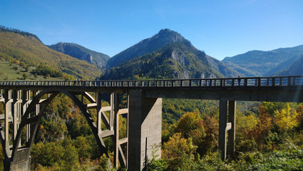 The famous bridge in the canyon of the Tara river in autumn